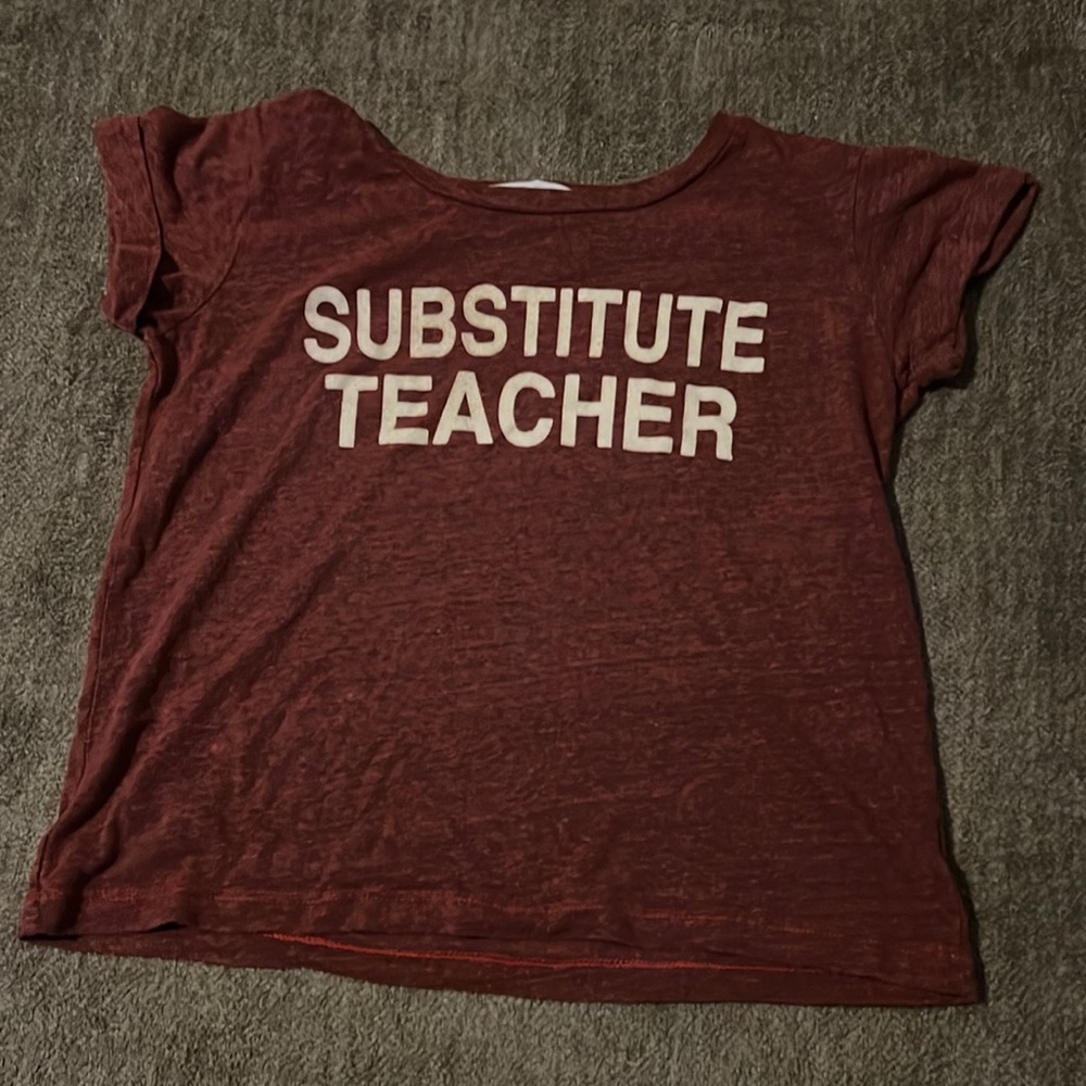 Red with white letters, barely worn small shirt. Brand is Project Social T.